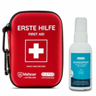 Erste-Hilfe-Set mit rotem Etui und Wundspray.