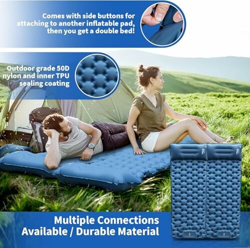 Aufblasbare Doppelmatratze vor Zelt auf Wiese