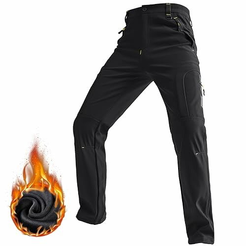 Schwarze Winterwanderhose für Herren mit Flammenmotiv.